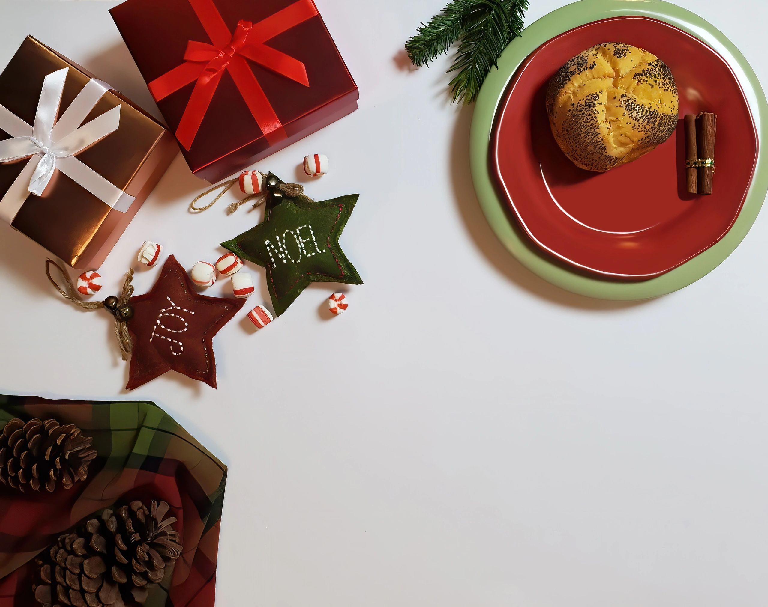 Festive flat lay of wrapped gifts and holiday accents