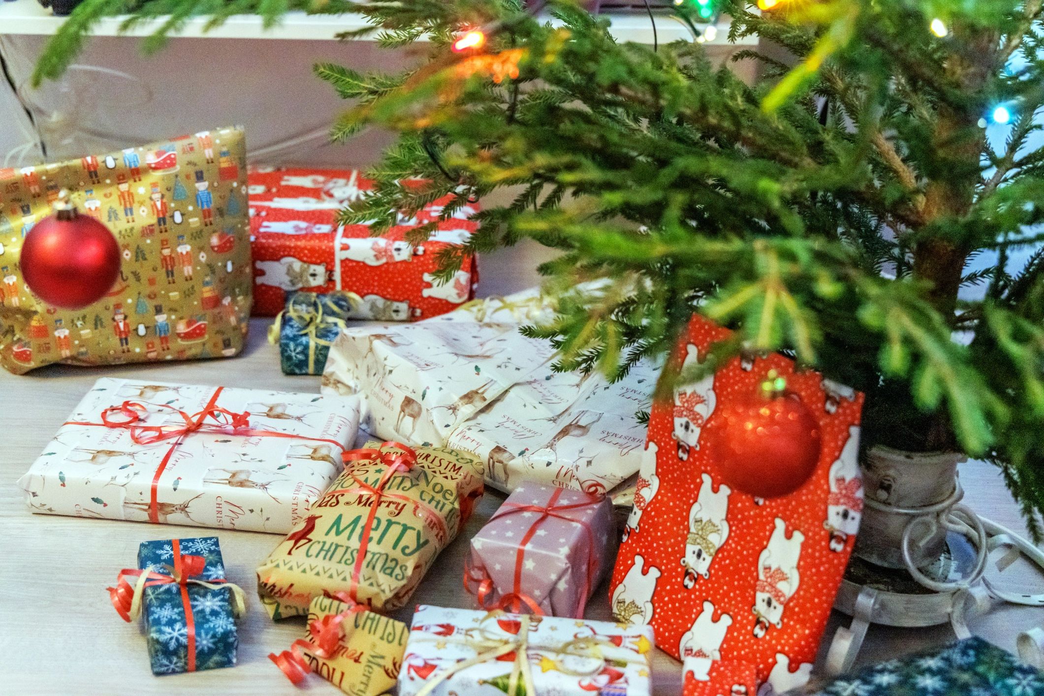 Decorated holiday tree with wrapped seasonal presents